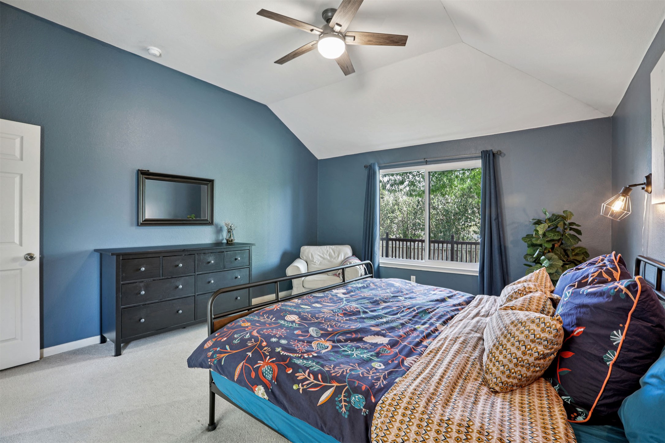 902 Ridgemont Circle Leander, TX 78641 - Photo 13 of 34 a bedroom with a bed and a window