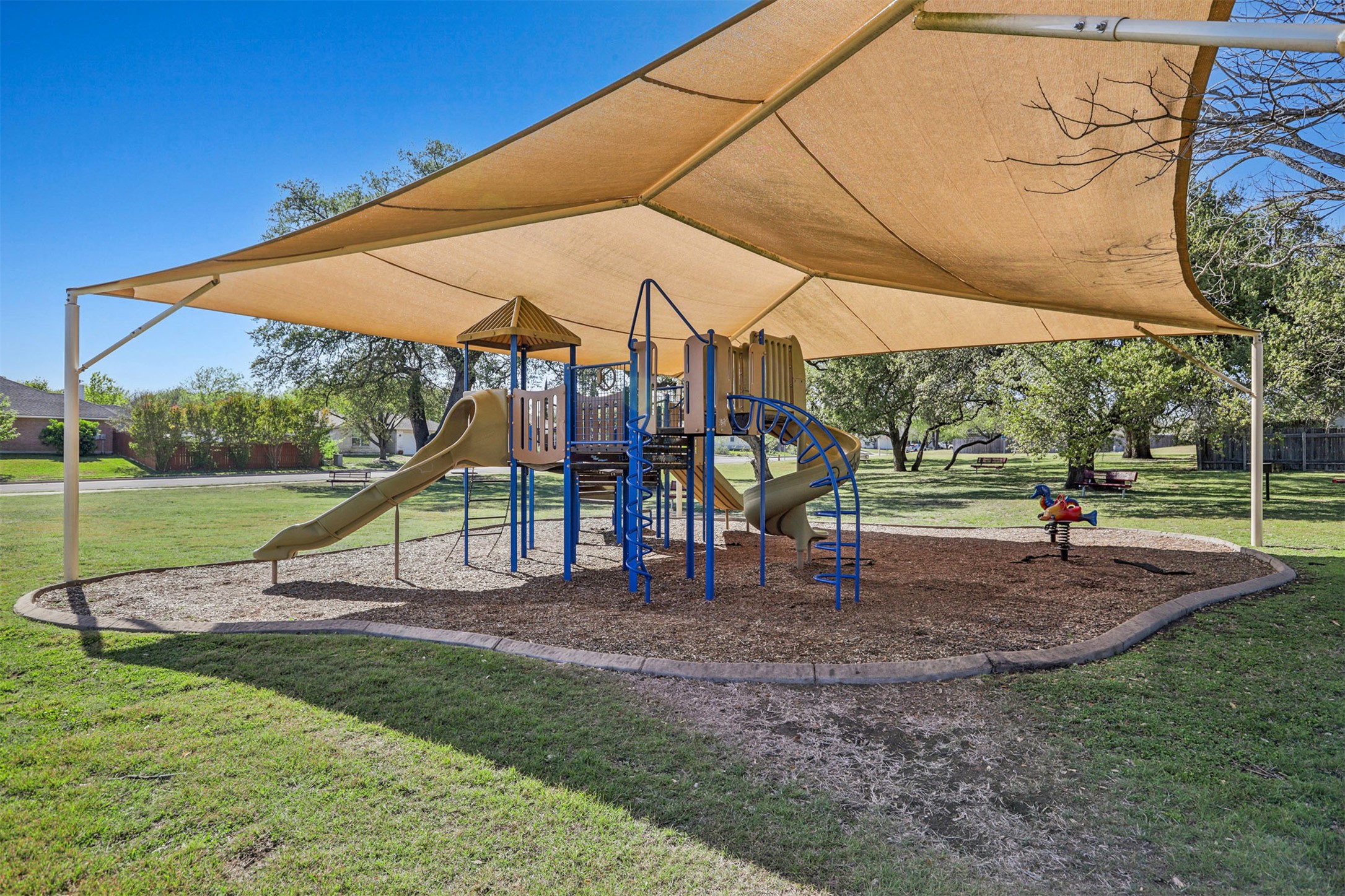 902 Ridgemont Circle Leander, TX 78641 - Photo 30 of 34 a view of outdoor space with playground and green space
