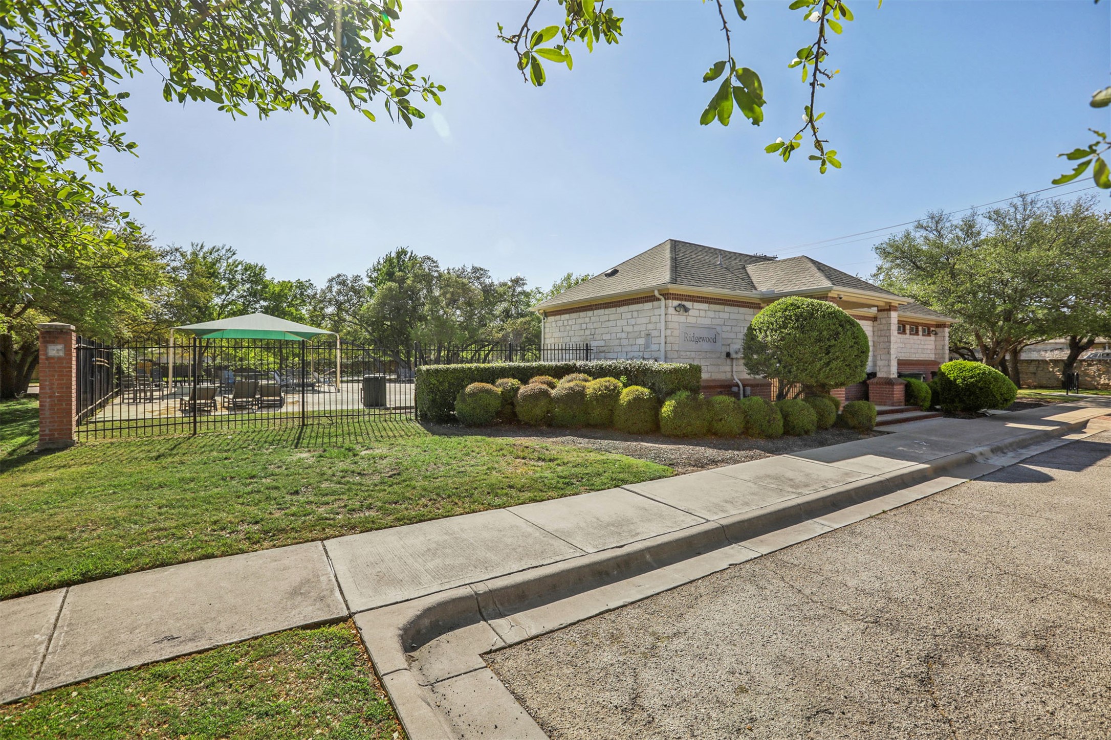 902 Ridgemont Circle Leander, TX 78641 - Photo 31 of 34 a front view of a house with a yard and a garage
