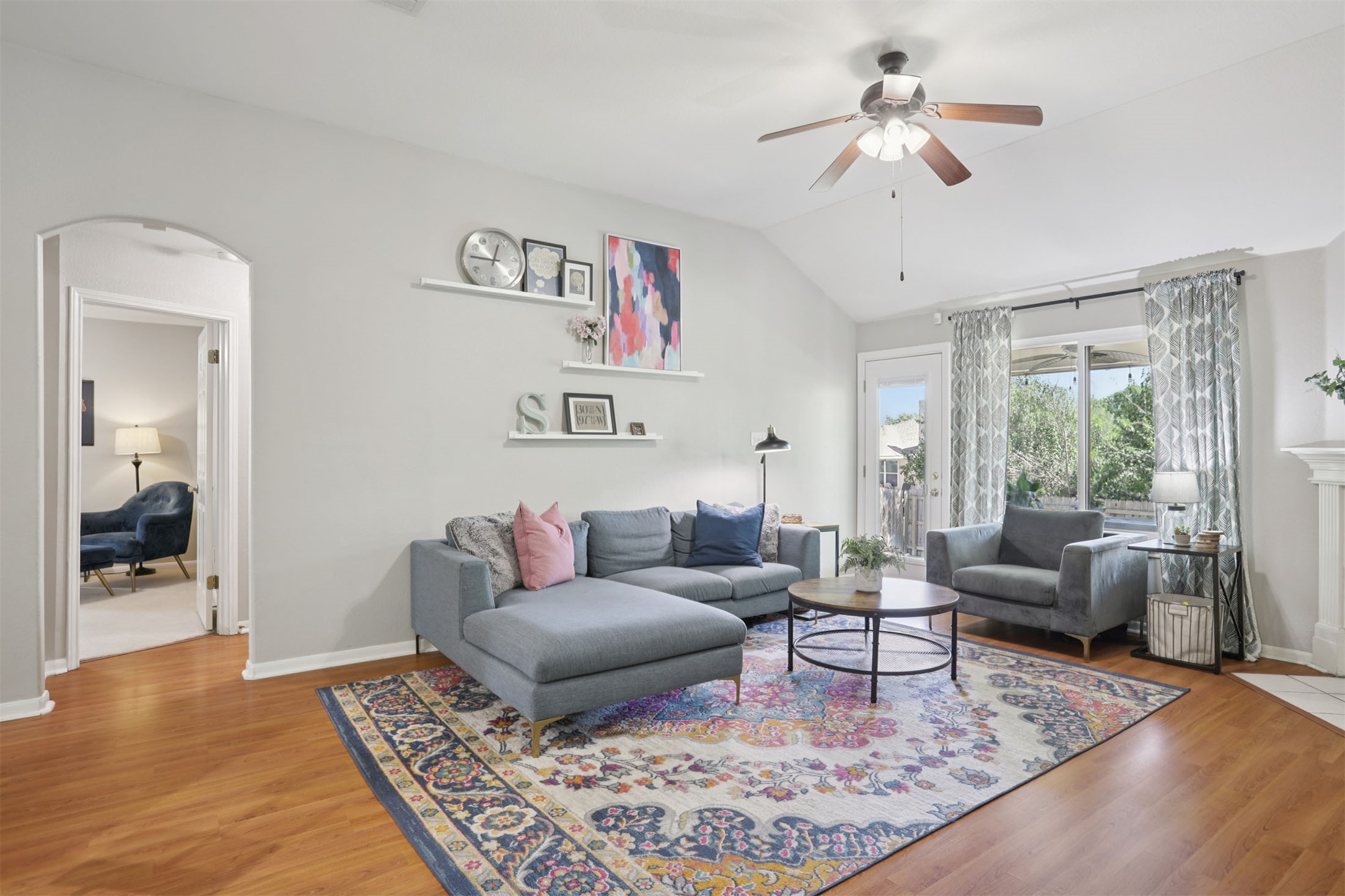 902 Ridgemont Circle Leander, TX 78641 - Photo 4 of 34 a living room with furniture and a rug