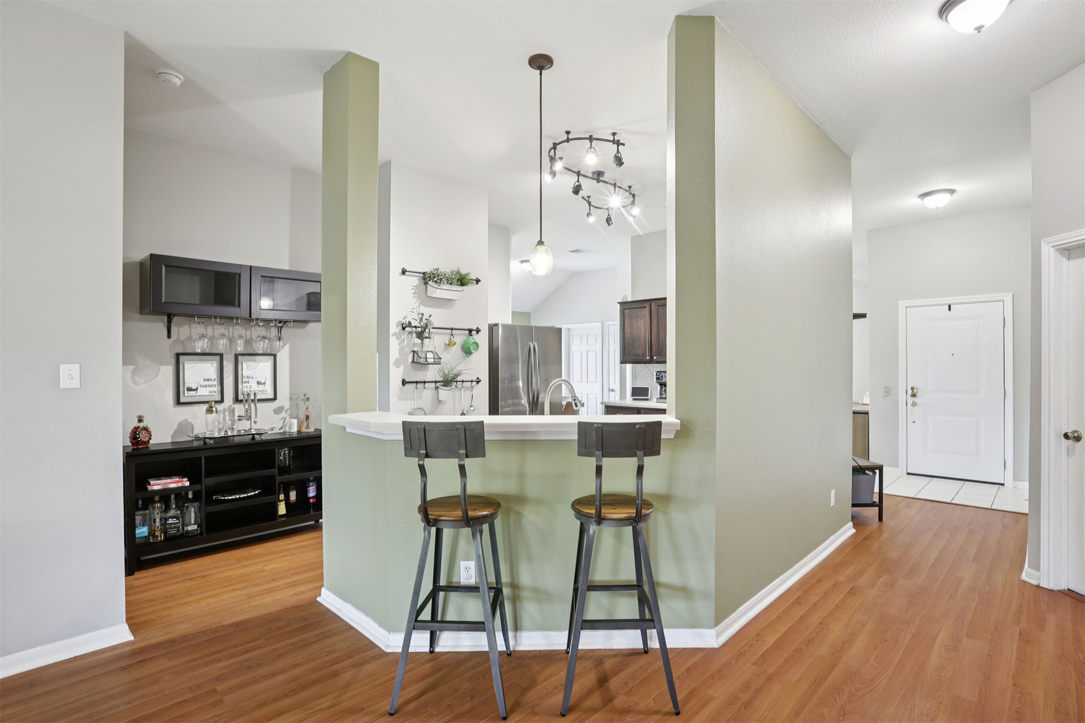 902 Ridgemont Circle Leander, TX 78641 - Photo 7 of 34 a view of a dining room with furniture window and wooden floor