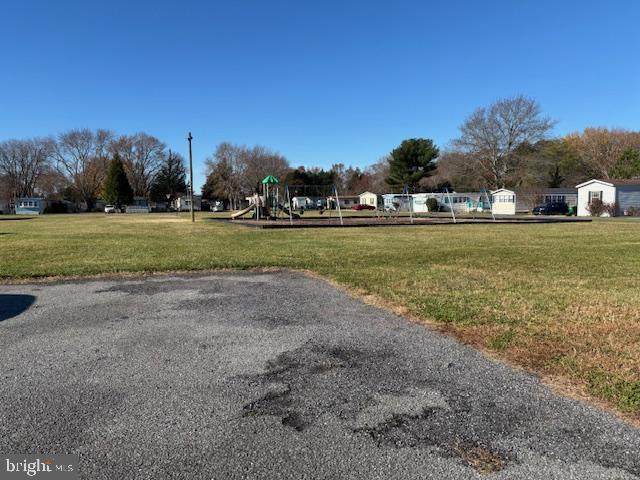 31706 Janice Road Lewes, DE 19958 - Photo 18 of 20 a view of grassy field with trees