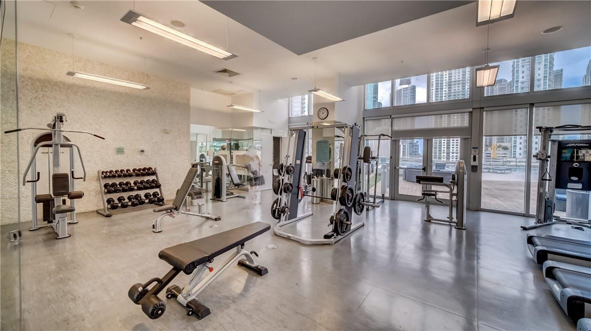 92 Southwest 3rd Street, Unit 1606 Miami, FL 33130 - Photo 25 of 62 a view of a room with gym equipment