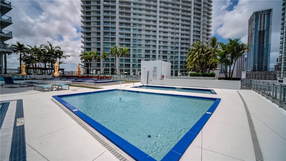 92 Southwest 3rd Street, Unit 1606 Miami, FL 33130 - Photo 30 of 62 swimming pool view with a outdoor seating