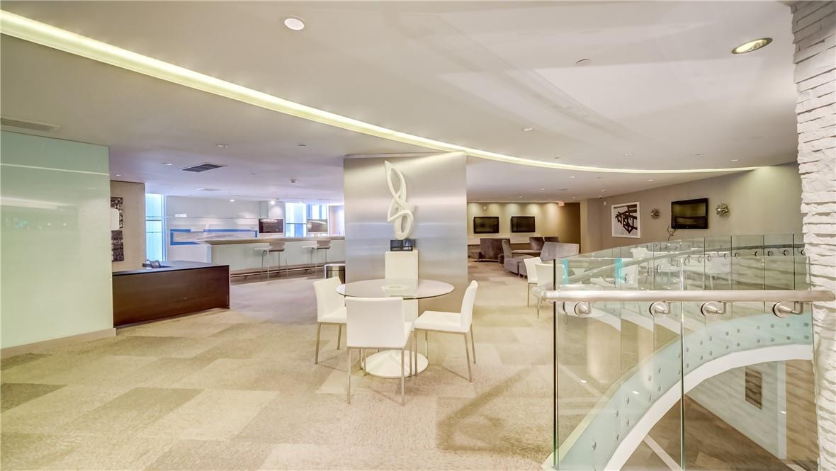 92 Southwest 3rd Street, Unit 1606 Miami, FL 33130 - Photo 36 of 62 a large white kitchen with a large window