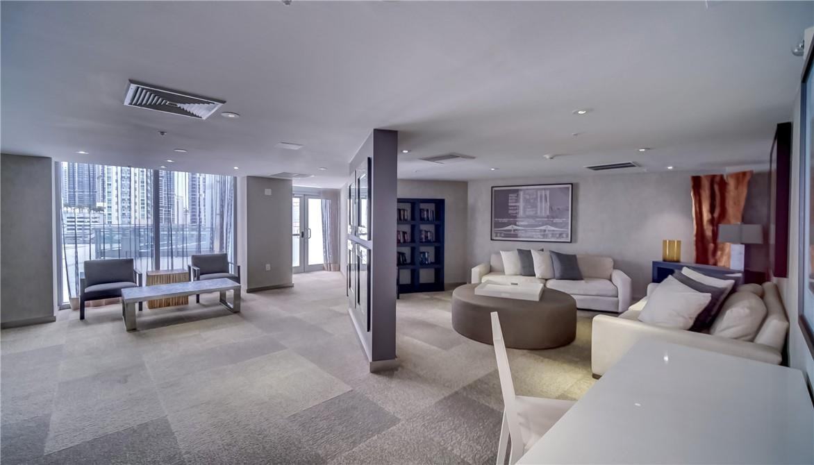 92 Southwest 3rd Street, Unit 1606 Miami, FL 33130 - Photo 42 of 62 a living room with furniture and large windows