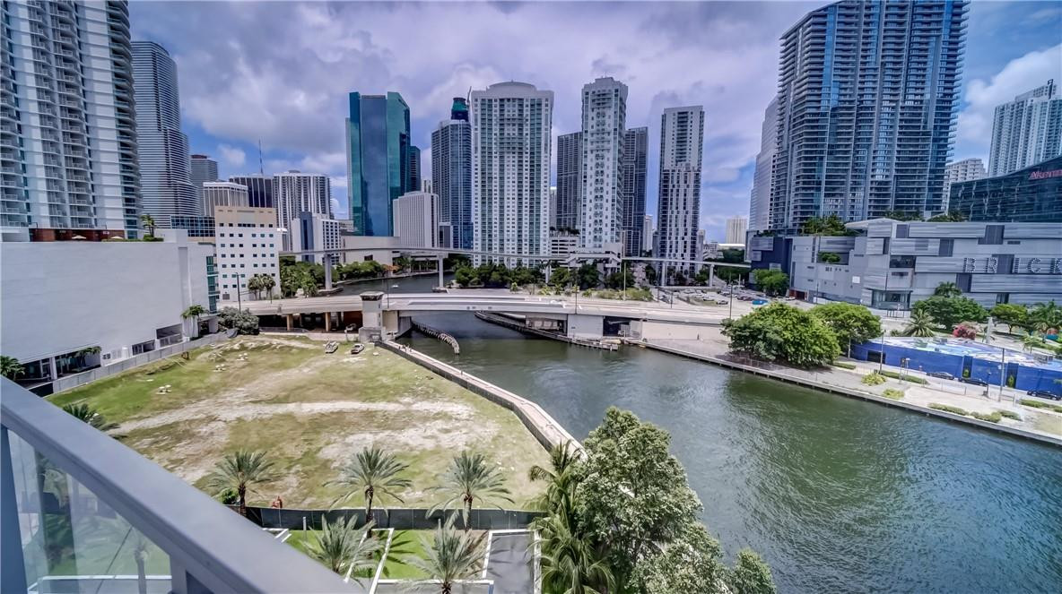 92 Southwest 3rd Street, Unit 1606 Miami, FL 33130 - Photo 47 of 62 a view of swimming pool with outdoor seating and plants