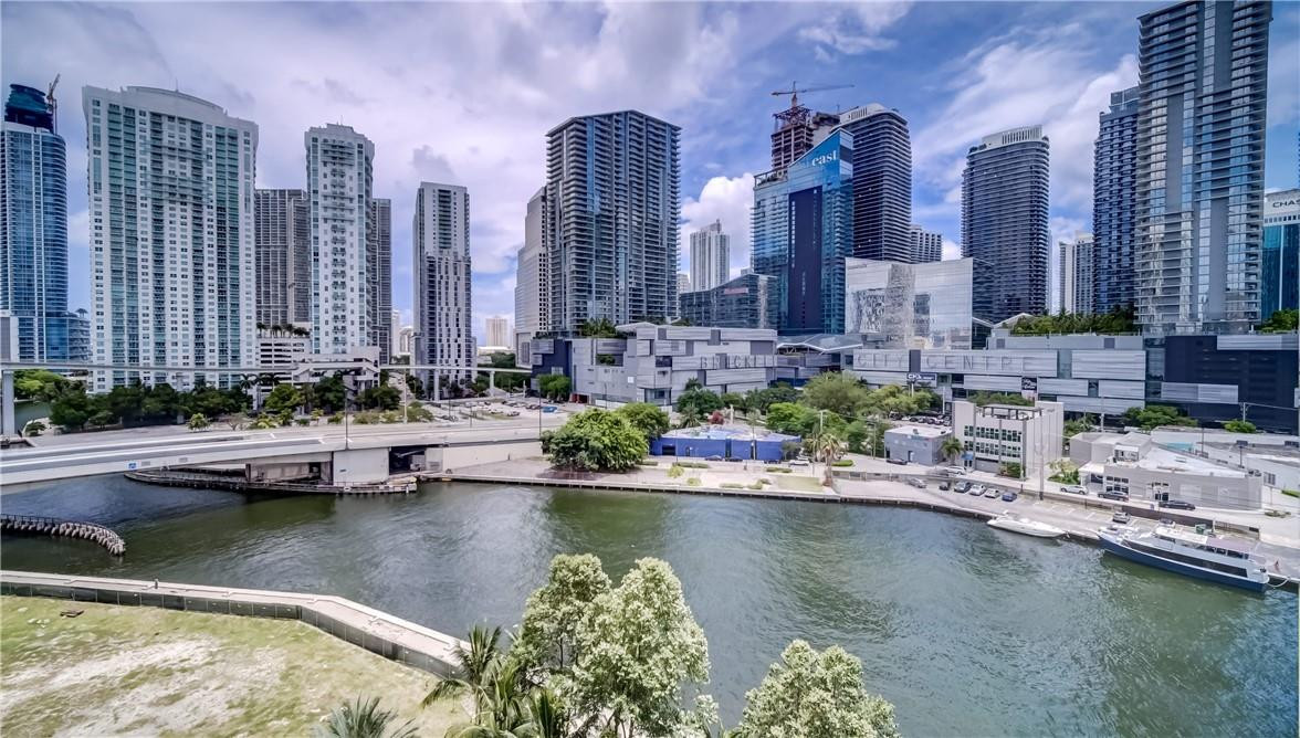 92 Southwest 3rd Street, Unit 1606 Miami, FL 33130 - Photo 48 of 62 a view of house with swimming pool and outdoor seating