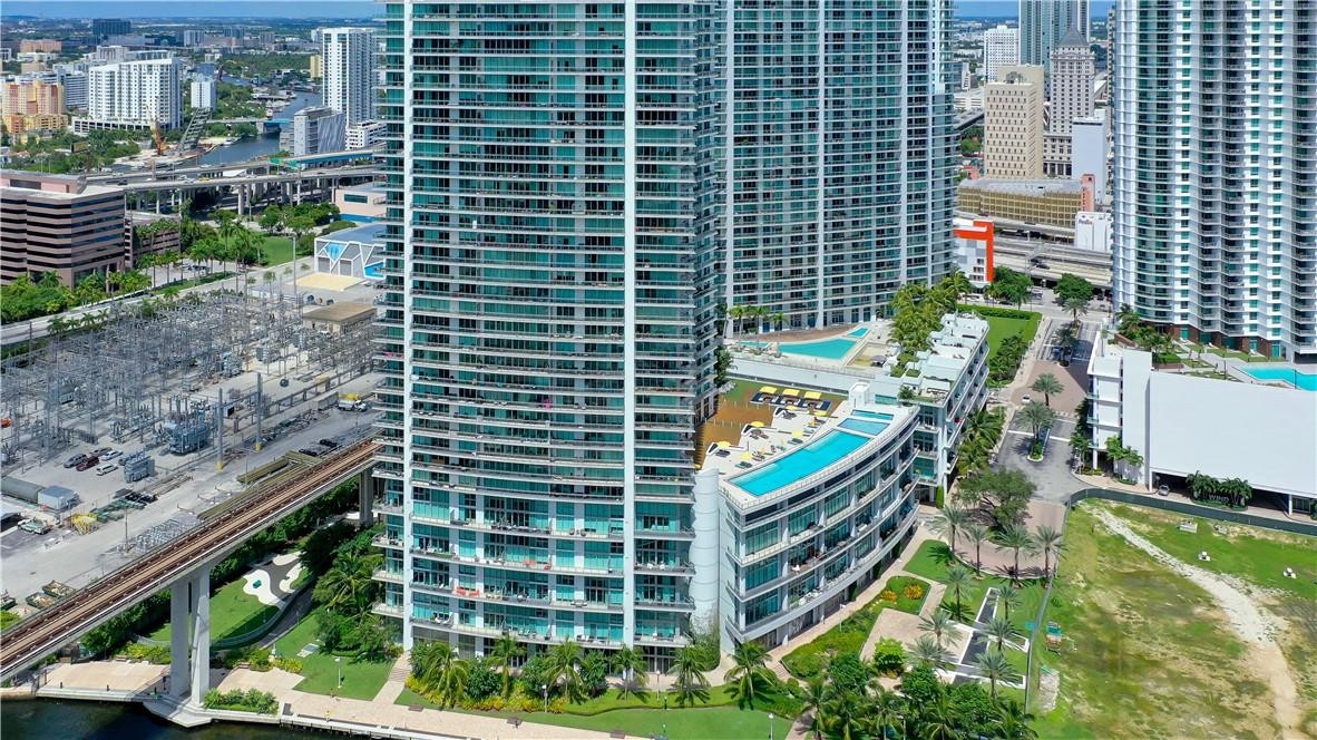 92 Southwest 3rd Street, Unit 1606 Miami, FL 33130 - Photo 57 of 62 a view of a balcony with a potted plants