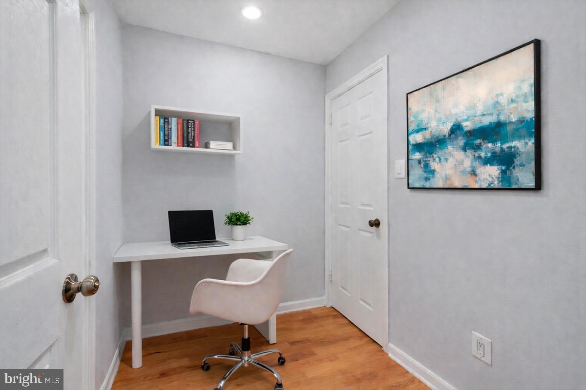 1909 North Rhodes Street, Unit 25 Arlington, VA 22201 - Photo 14 of 30 a view of a workspace with furniture