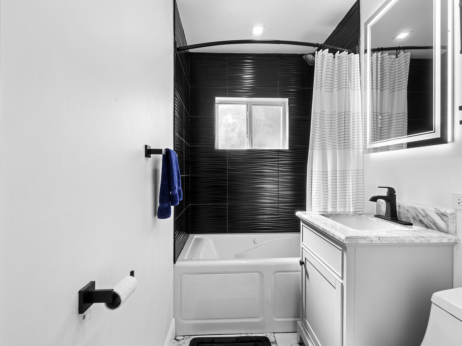 6960 Thomas Street Hollywood, FL 33021 - Photo 19 of 32 a bathroom with a sink toilet and tub