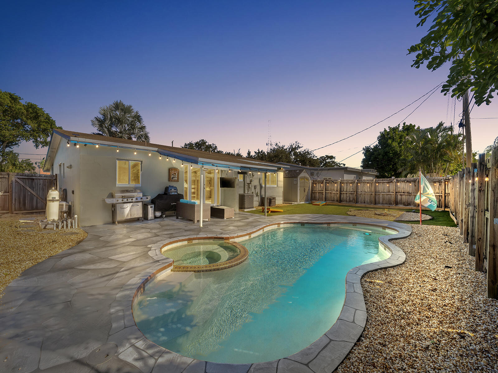 6960 Thomas Street Hollywood, FL 33021 - Photo 22 of 32 a view of a swimming pool with a patio
