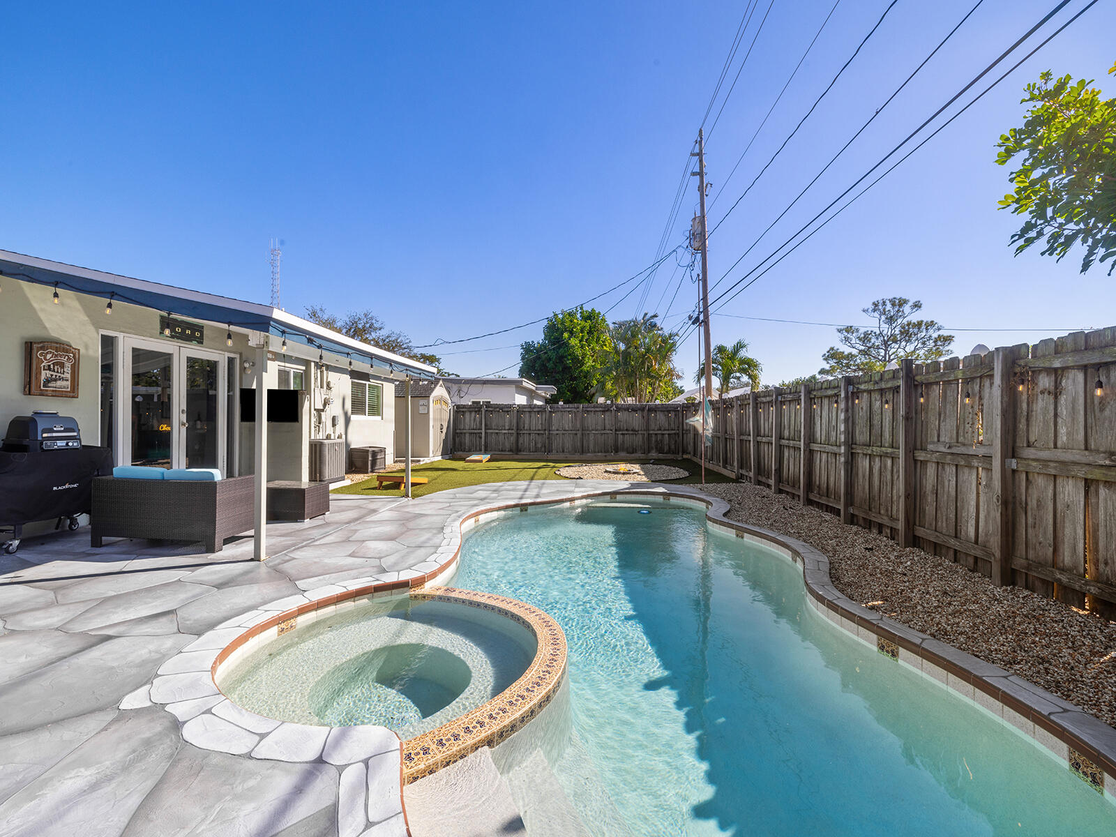 6960 Thomas Street Hollywood, FL 33021 - Photo 25 of 32 a view of a swimming pool with a patio