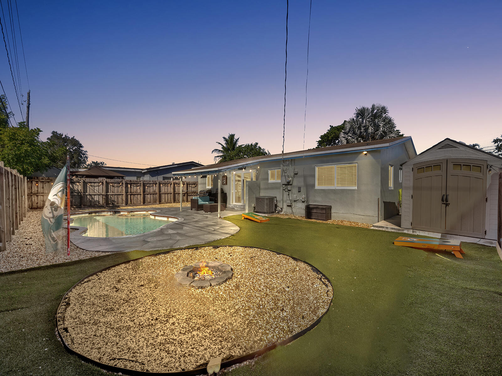 6960 Thomas Street Hollywood, FL 33021 - Photo 26 of 32 a view of a house with swimming pool