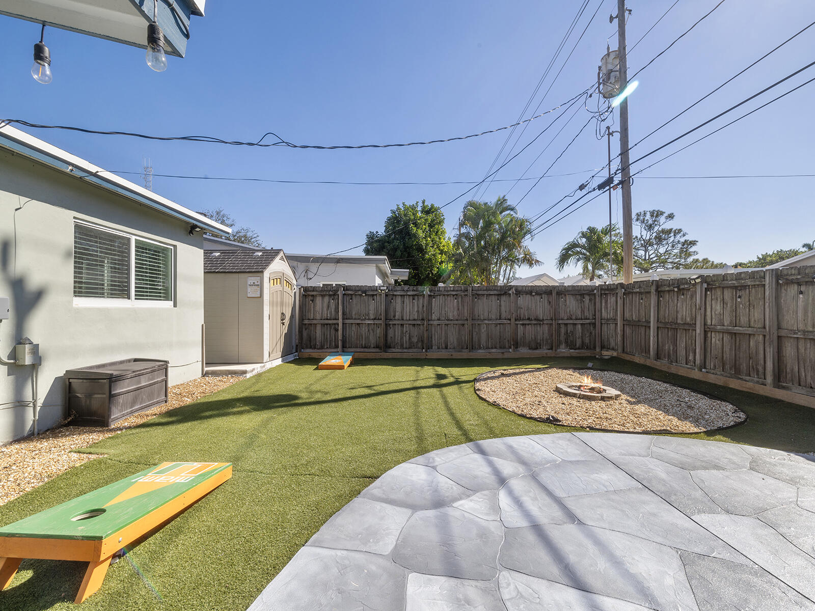 6960 Thomas Street Hollywood, FL 33021 - Photo 27 of 32 a view of a backyard with furniture and a tub