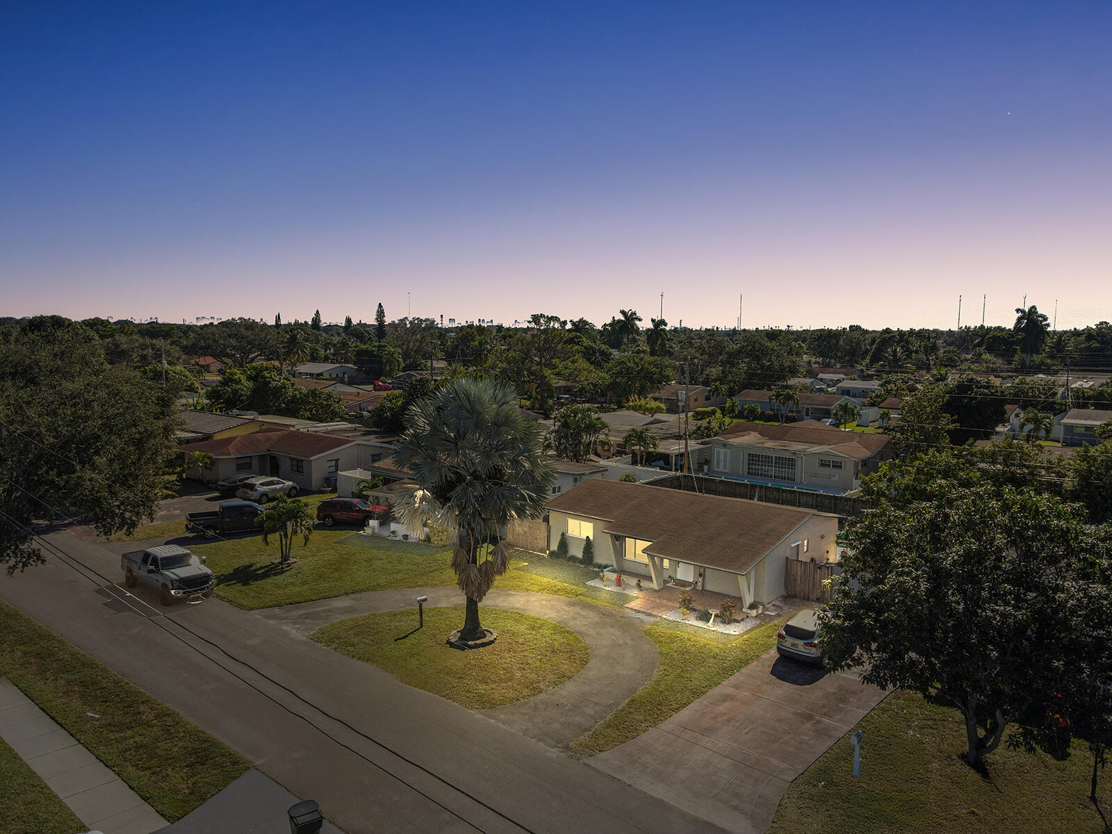 6960 Thomas Street Hollywood, FL 33021 - Photo 32 of 32 a view of a lake in middle of the town