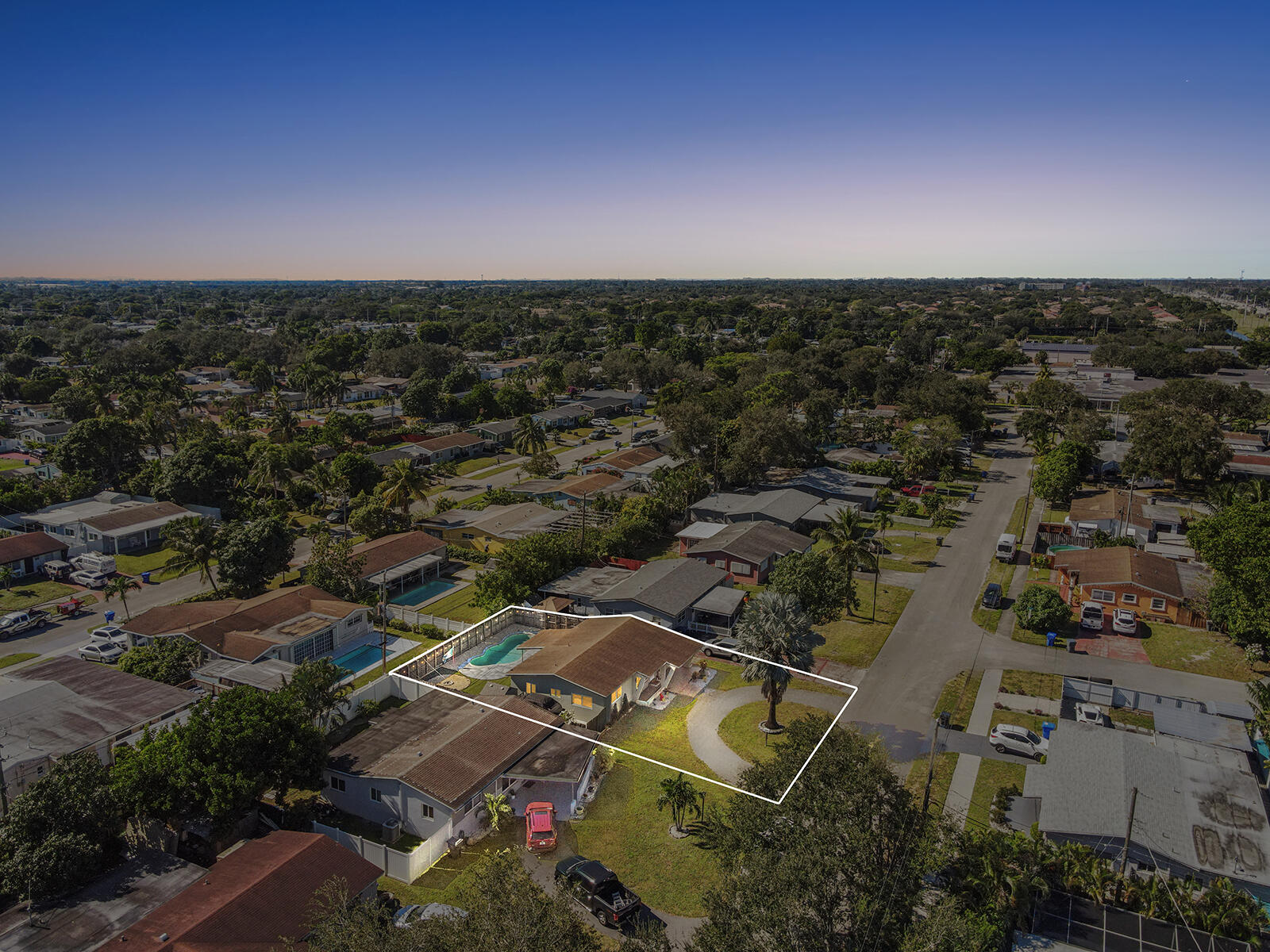 6960 Thomas Street Hollywood, FL 33021 - Photo 5 of 32 an aerial view of a city with lots of residential buildings