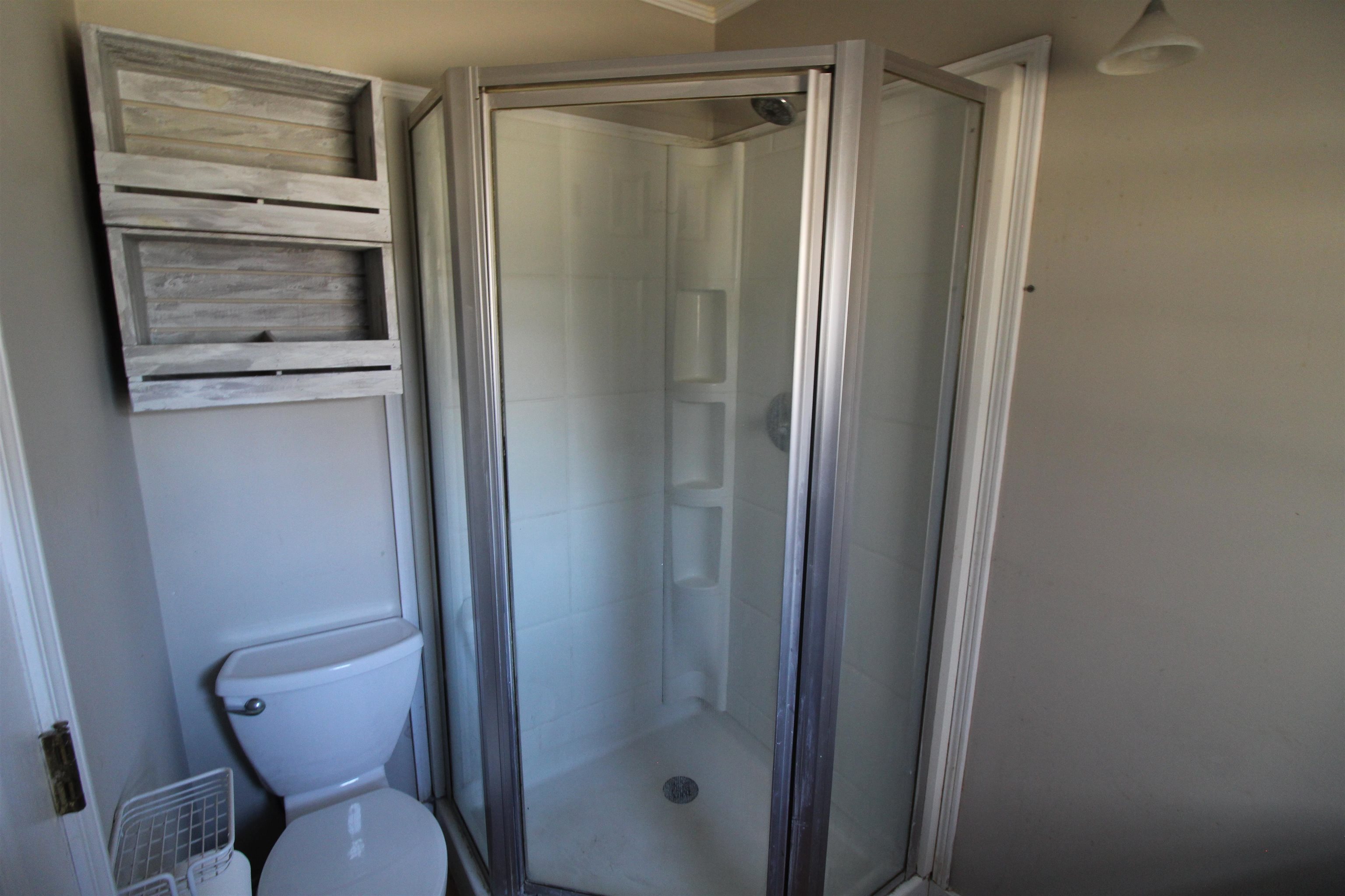 143 Marys Chapel Road Ripley, TN 38063 - Photo 13 of 23 Full bathroom with a stall shower