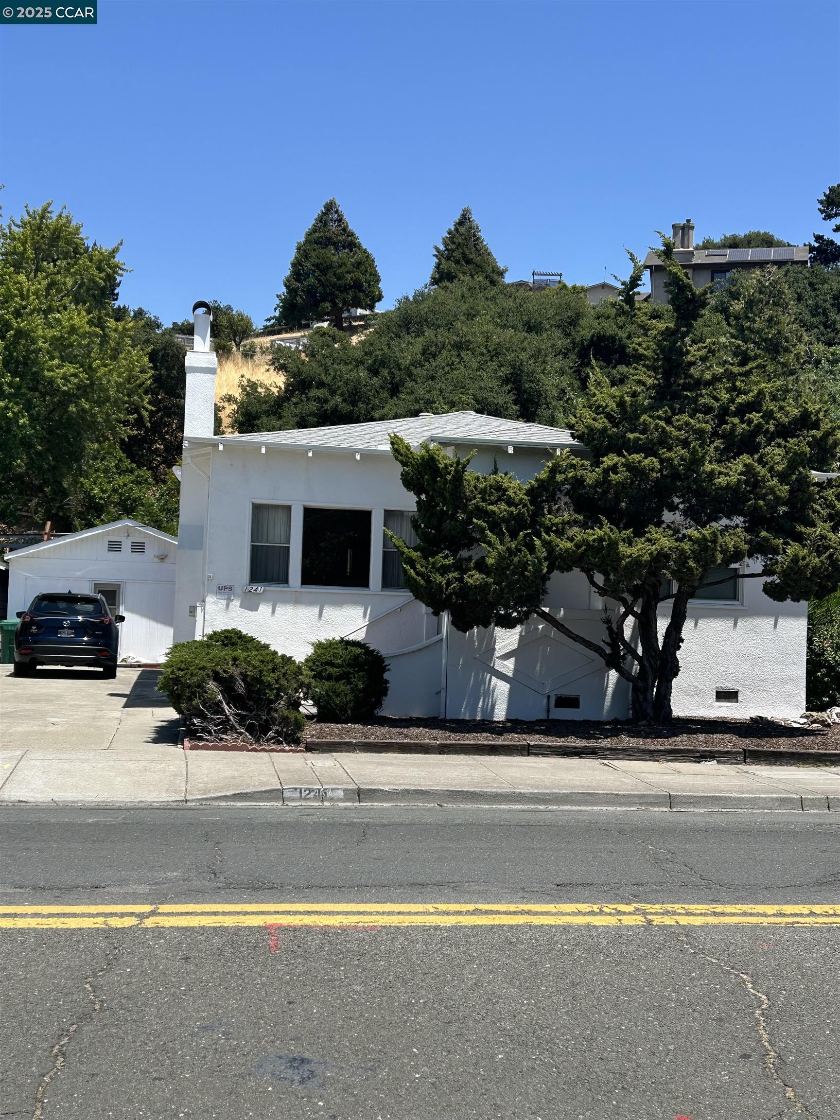 1241 Pinole Valley Road Pinole, CA 94564 - Photo 1 of 1 a view of a house with a swimming pool