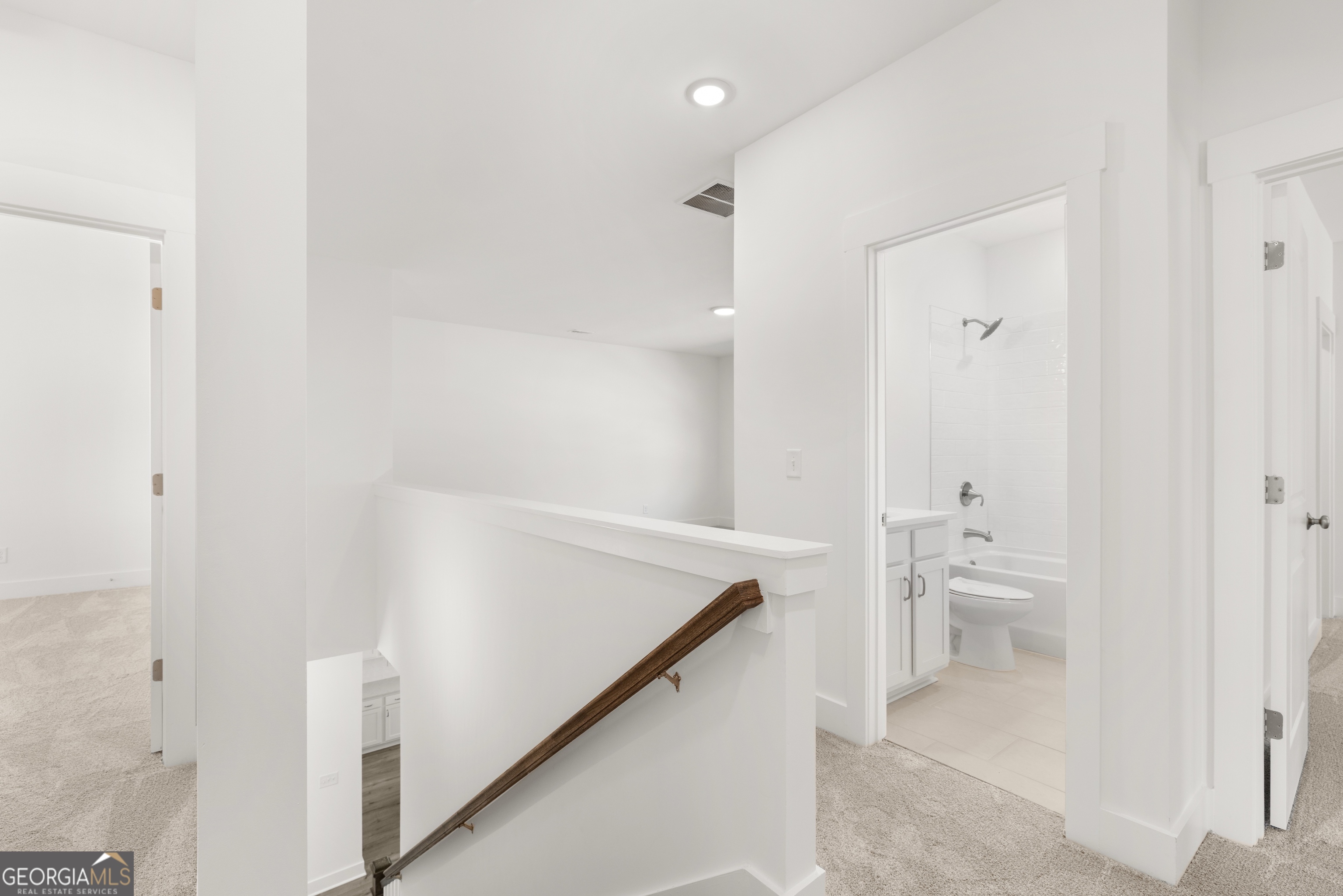 15 Overview Court Hoschton, GA 30548 - Photo 27 of 43 a bathroom with a toilet sink and a tub
