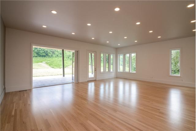 3136 Southall Road Franklin, TN 37064 - Photo 9 of 20 View of living room & dining with accordion door open to covered back patio!