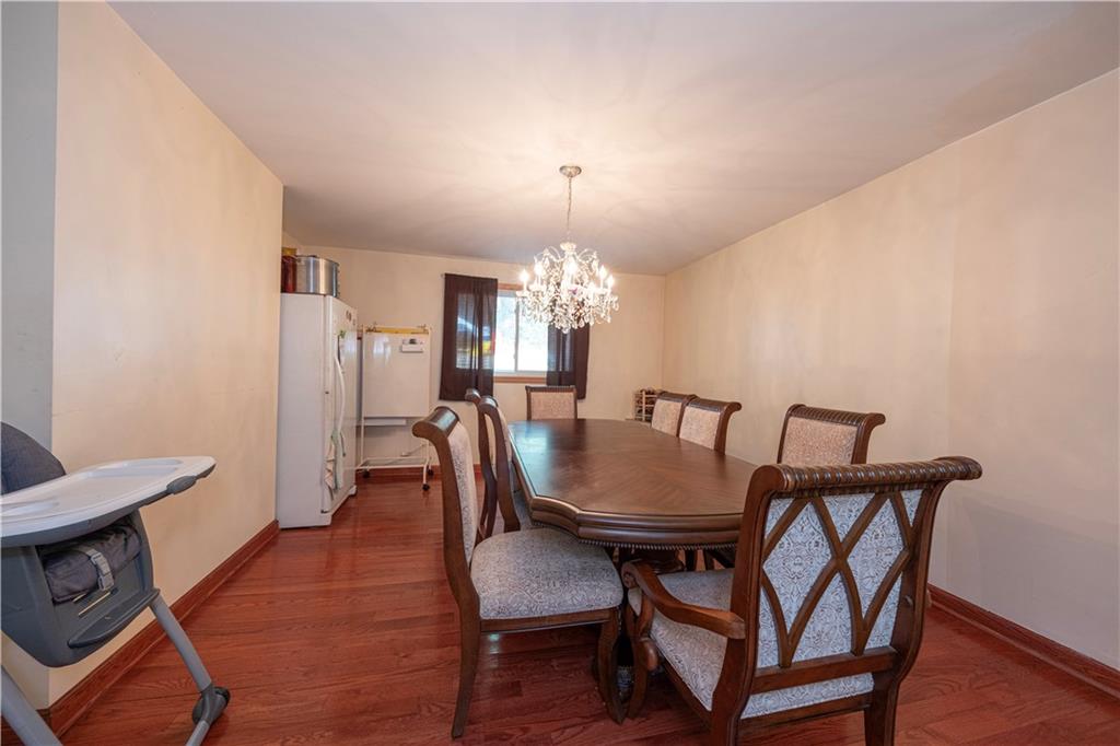 33 5th Street Pittsburgh, PA 15215 - Photo 5 of 32 a view of a dining room with furniture and chandelier