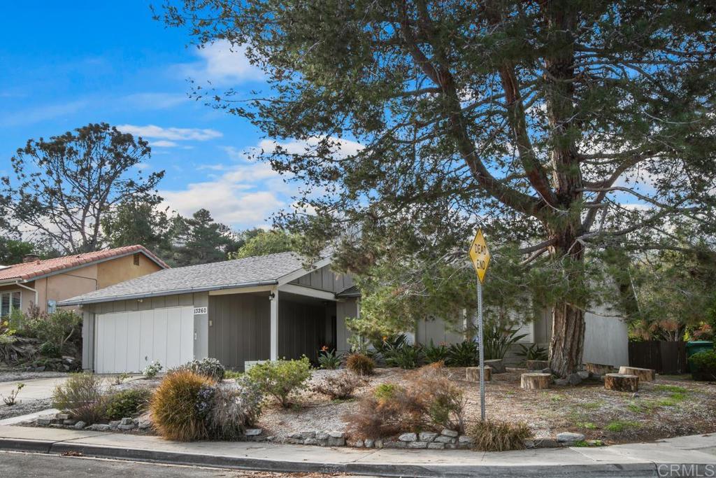 13260 Carousel Lane Del Mar, CA 92014 - Photo 1 of 10 a front view of a house with a yard