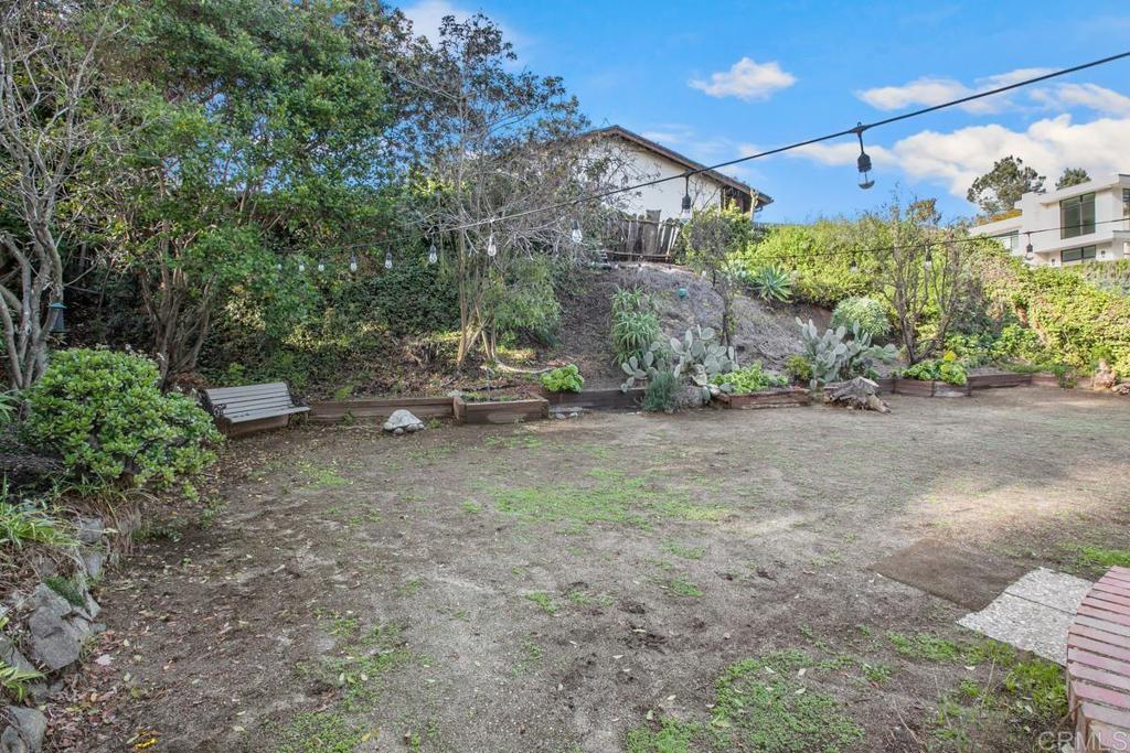 13260 Carousel Lane Del Mar, CA 92014 - Photo 8 of 10 a backyard of a house with lots of green space