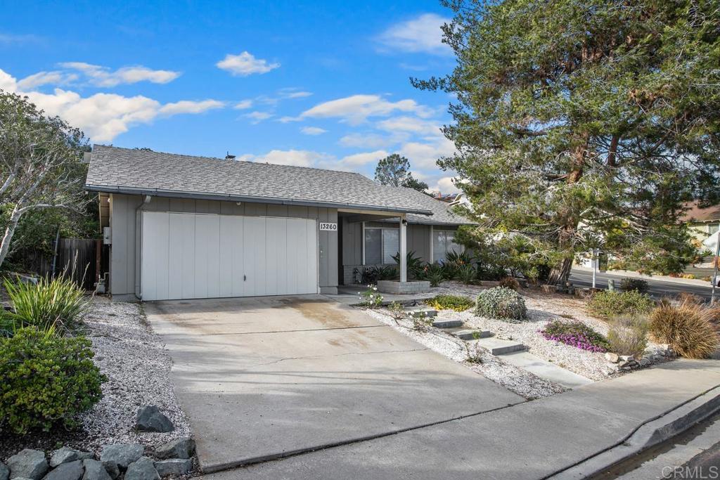 13260 Carousel Lane Del Mar, CA 92014 - Photo 10 of 10 a row of palm trees in front of yellow house