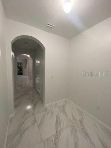 8836 Indigo Trail Loop Riverview, FL 33578 - Photo 4 of 11 a view of a hallway with wooden floor
