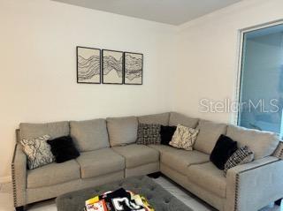 8836 Indigo Trail Loop Riverview, FL 33578 - Photo 9 of 11 a living room with furniture and a couch