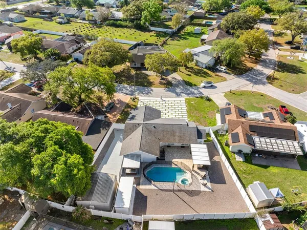 a view of house with yard outdoor seating and entertaining space