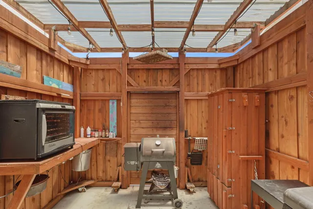 a backyard of a house with seating space