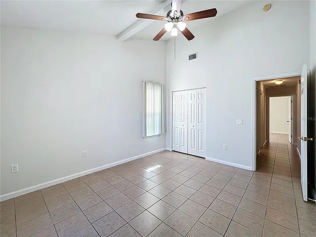 a bathroom with a sink toilet and mirror