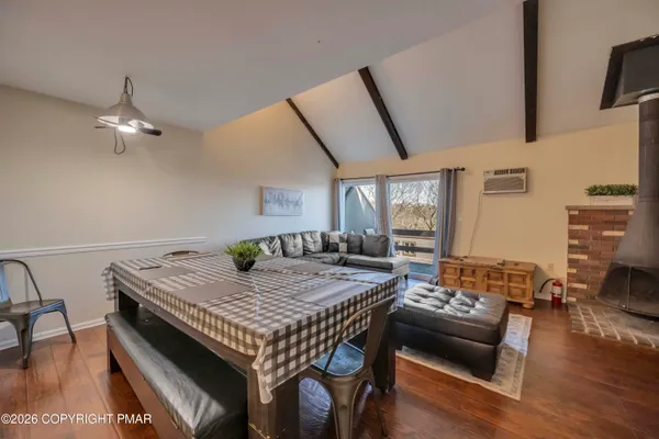a living room with furniture and a table