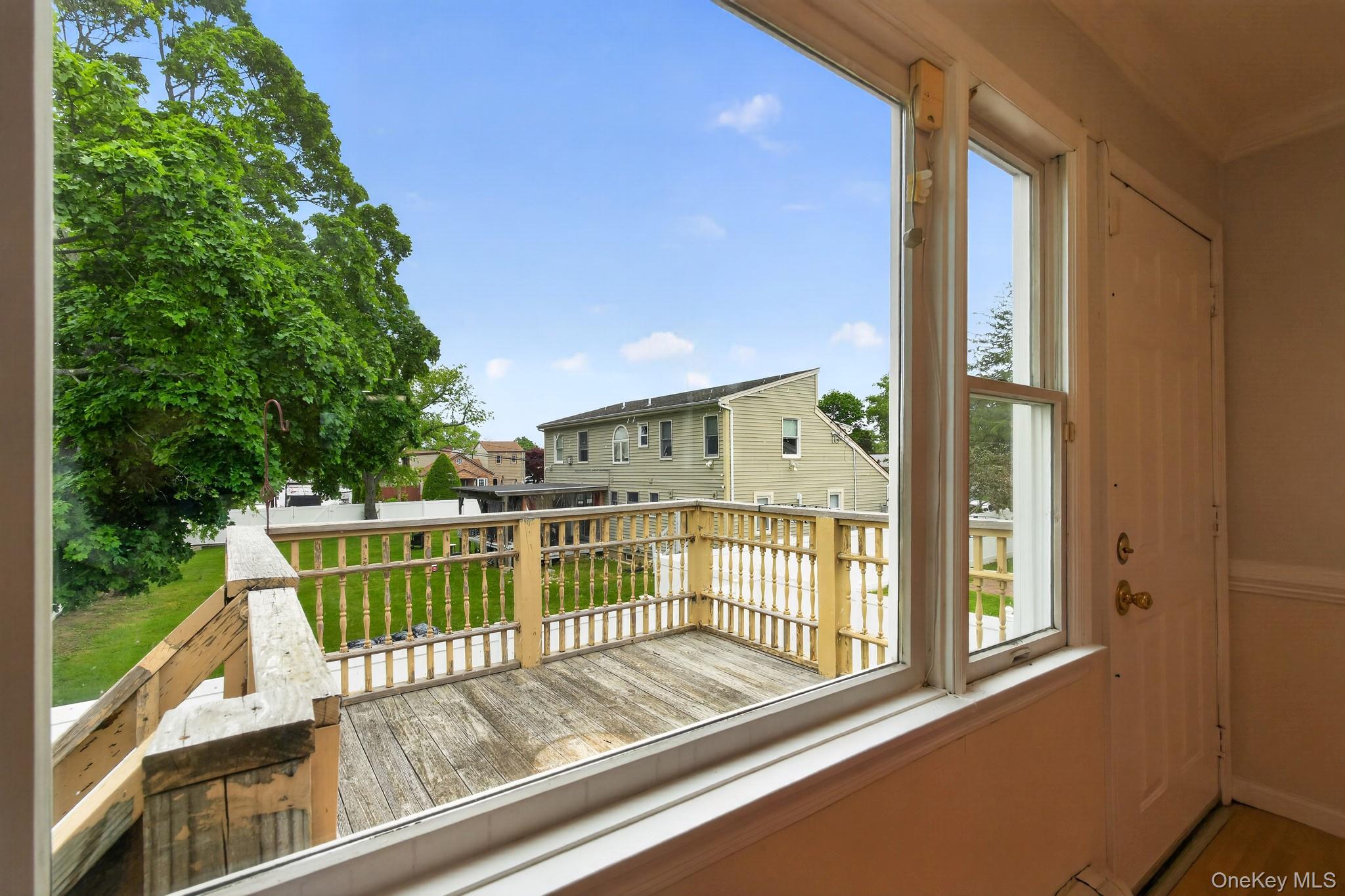 138 Spring Street Massapequa, NY 11758 - Photo 14 of 45 a view of a balcony