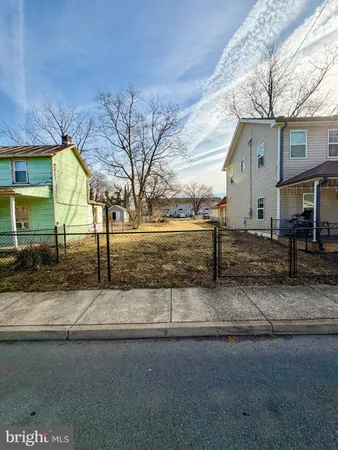 a view of a house with a park