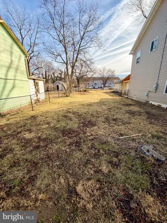 a view of yard covered with snow