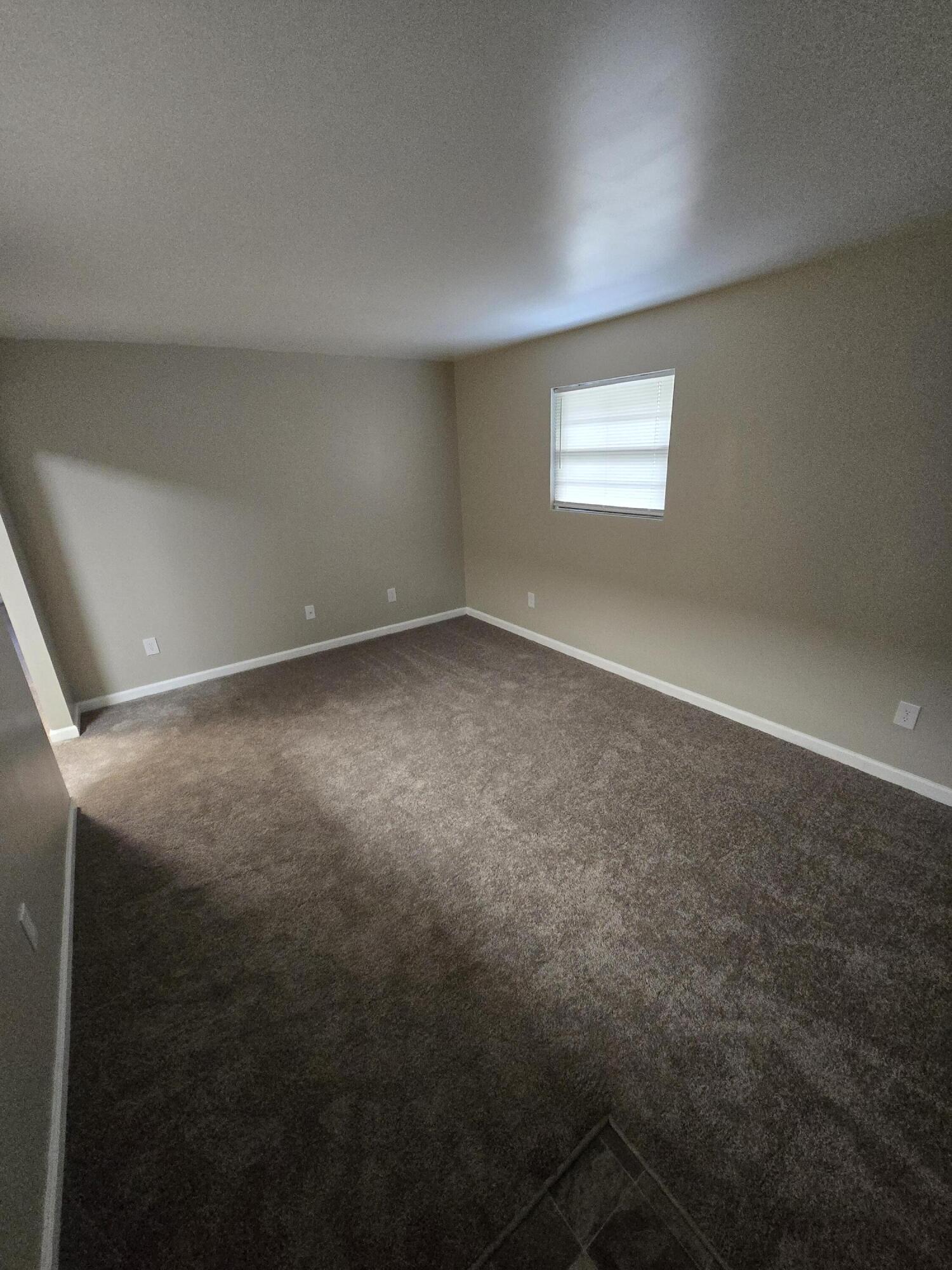 220 8th Street, Unit E10 Vinton, VA 24179 - Photo 13 of 13 a view of an empty room with a window