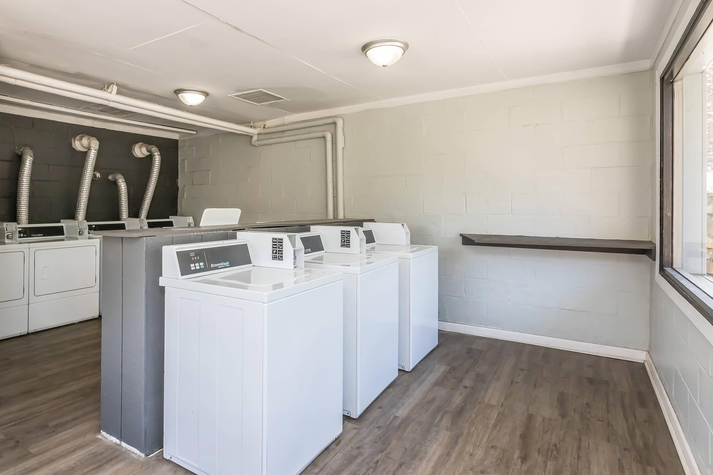 220 8th Street, Unit E10 Vinton, VA 24179 - Photo 4 of 13 a utility room with dryer and washer