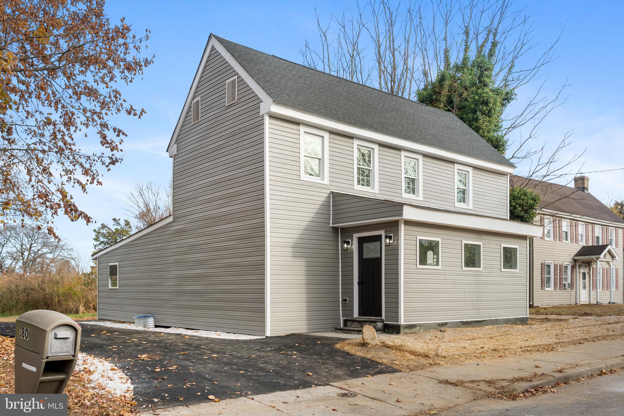 380 Main Street Dover, DE 19901 - Photo 15 of 15 a front view of a house with a yard