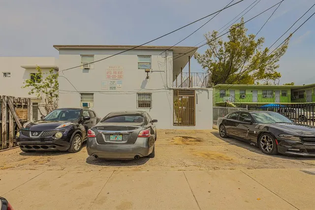 a car parked in front of a house