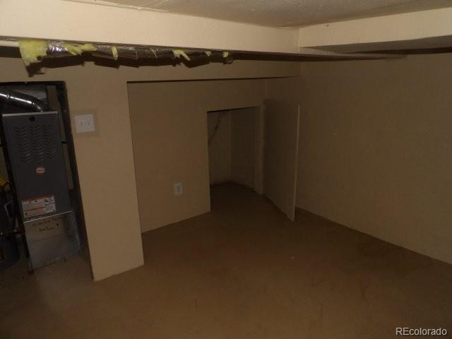 935 Walnut Street Brighton, CO 80601 - Photo 11 of 12 wooden floor in an empty room
