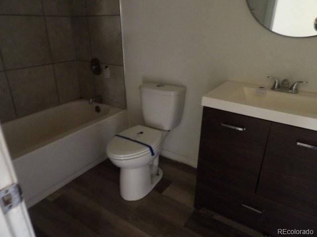 935 Walnut Street Brighton, CO 80601 - Photo 10 of 12 a bathroom with a sink toilet and shower