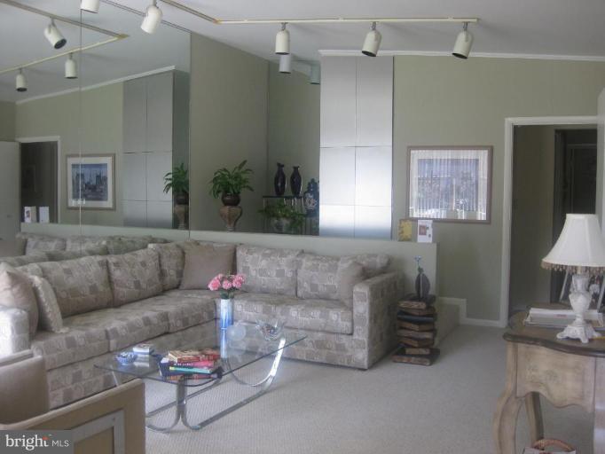 2418 Forest Green Road Baltimore, MD 21209 - Photo 2 of 12 a living room with furniture and a couch