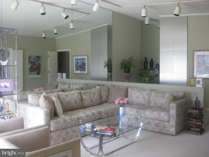 2418 Forest Green Road Baltimore, MD 21209 - Photo 3 of 12 a living room with furniture and a couch