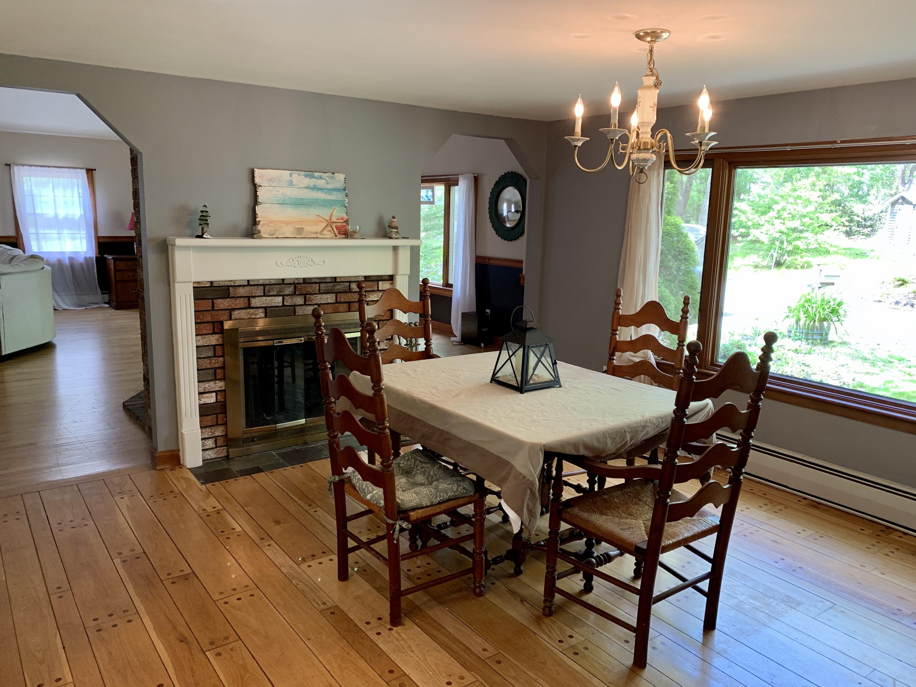 41 Suomi Road Hyannis, MA 02601 - Photo 3 of 25 a view of a dining room with furniture window and wooden floor