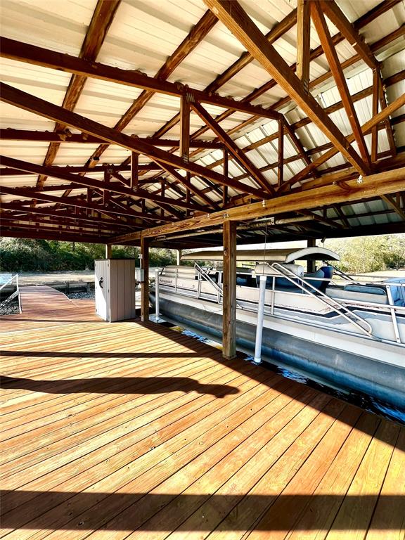 0 LCR 799 Groesbeck, TX 76642 - Photo 10 of 24 a bedroom with a bed and wooden floor