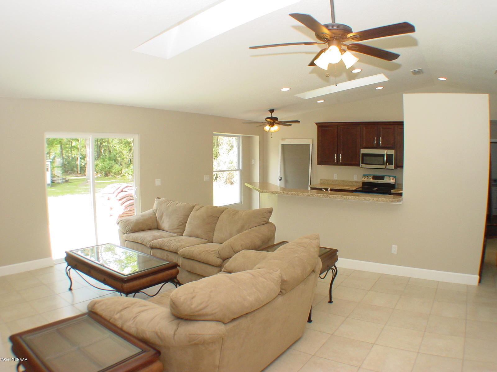 3005 Ragis Road Edgewater, FL 32132 - Photo 4 of 19 open living/kitchen area