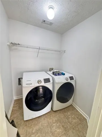 a view of workspace with wooden floor and window